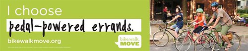 Biking promotion ad, bus shelter,  Bike Walk Move program, Minneapolis